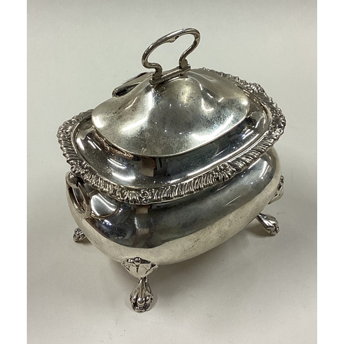 168 - A silver tea caddy with handles. Fully marked to body and part marked to cover. Birmingham 1914. App... 