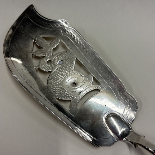 17 - A George III Scottish silver fish slice with pierced decoration. Approx. 136 grams. Est. £120 - £150... 