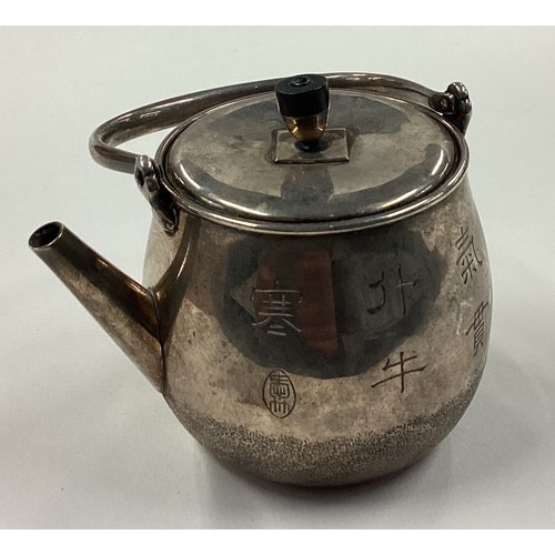 170 - A rare Japanese Meiji silver kettle engraved with character marks. Marked to base. Approx. 76 grams.... 