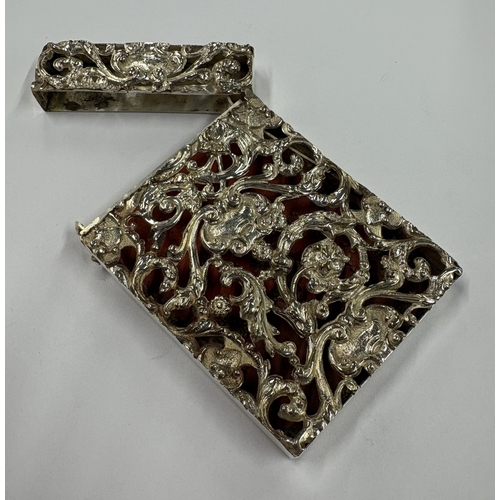 172 - A silver card case with pierced decoration. Approx. 77 grams. Est. £60 - £80.