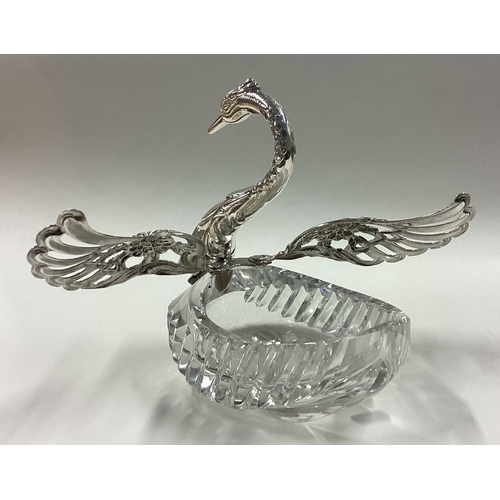 180 - A silver and glass centrepiece in the form of a swan. Marked 835. Est. £100 - £150.