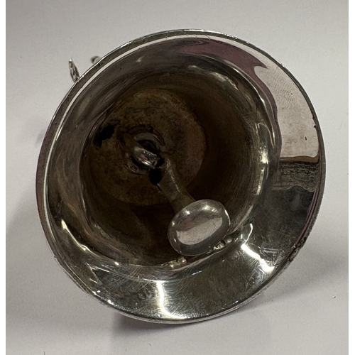 185 - A novelty figural silver table bell cast with cherub. London 1976. Approx. 169 grams. Est. £200 - £3... 