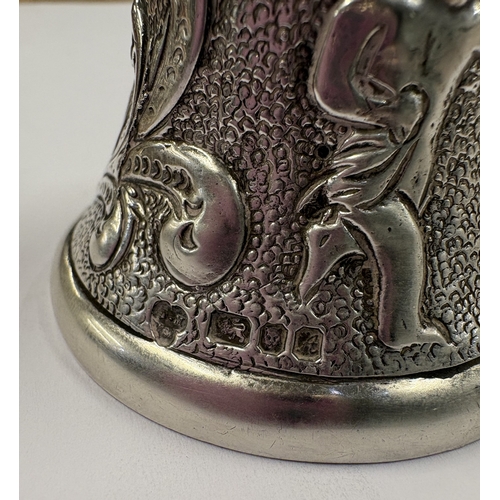 185 - A novelty figural silver table bell cast with cherub. London 1976. Approx. 169 grams. Est. £200 - £3... 