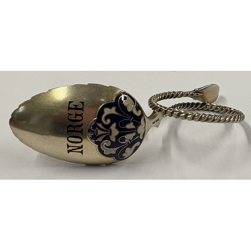 187 - A Norwegian silver and blue enamelled caddy spoon with spiralled handle. Approx. 35 grams. Est. £80 ... 