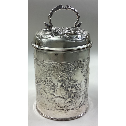 202 - An embossed Continental silver tea caddy with lift-off cover. Fully marked to base. Approx. 200 gram... 