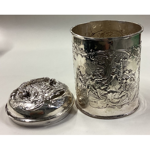 202 - An embossed Continental silver tea caddy with lift-off cover. Fully marked to base. Approx. 200 gram... 