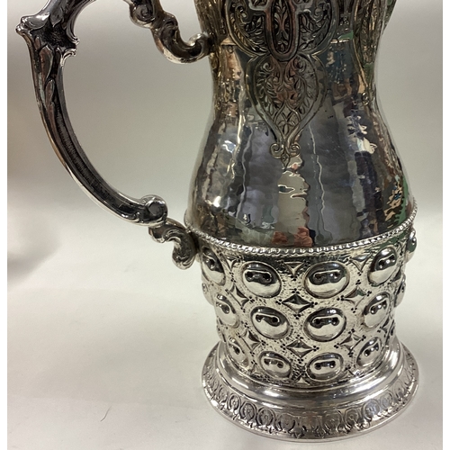 203 - A 19th Century Continental silver wine ewer. Marked to base. Approx. 935 grams. Est. £800 - £1200.