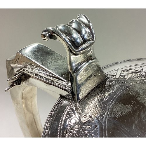 219 - A heavy 18th Century George III silver lidded tankard. Fully marked to body and cover. London 1776. ... 