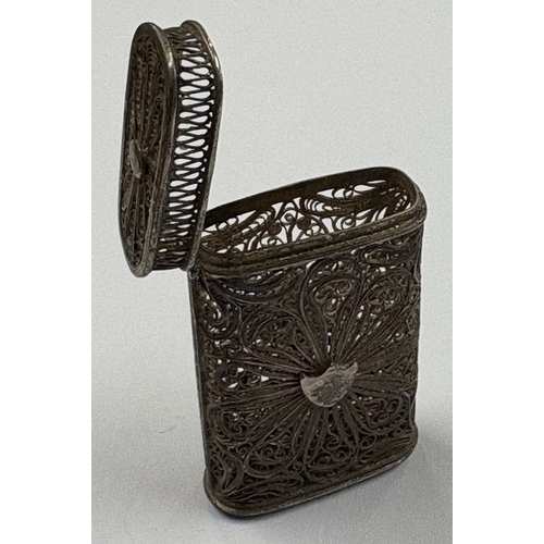 229 - A Victorian silver vesta case with filigree decoration. Approx. 16 grams. Est. £30 - £40.