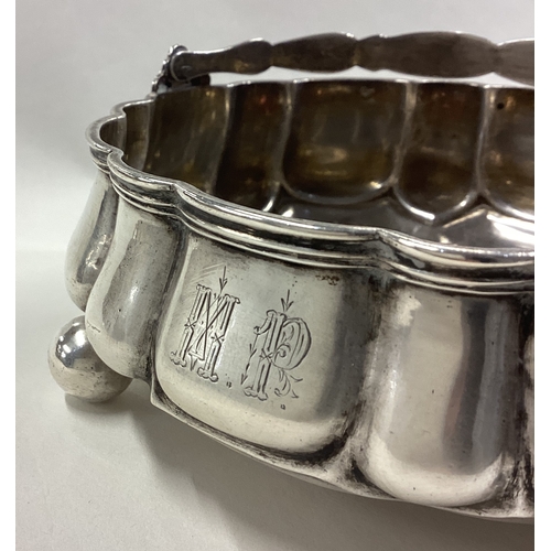 236 - A Russian silver sugar bowl with handle. Marked to base. Dated 1865. Approx. 239 grams. Est. £200 - ... 