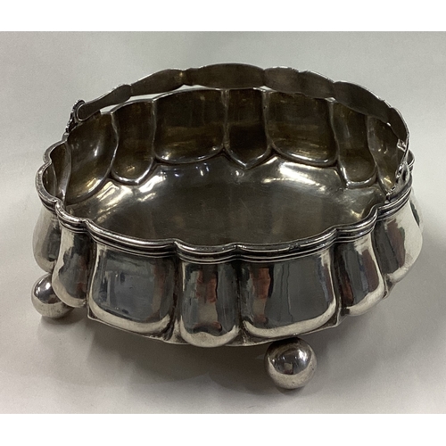 236 - A Russian silver sugar bowl with handle. Marked to base. Dated 1865. Approx. 239 grams. Est. £200 - ... 