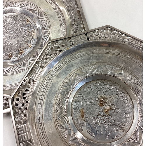 239 - A pair of Chinese export silver dishes with pierced borders. Approx. 100 grams. Est. £100 - £150.