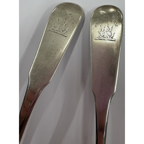 24 - EDINBURGH: A pair of Scottish silver toddy ladles with crested decoration. 1813. By James McKay. App... 