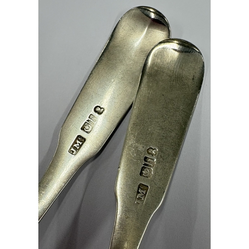 24 - EDINBURGH: A pair of Scottish silver toddy ladles with crested decoration. 1813. By James McKay. App... 