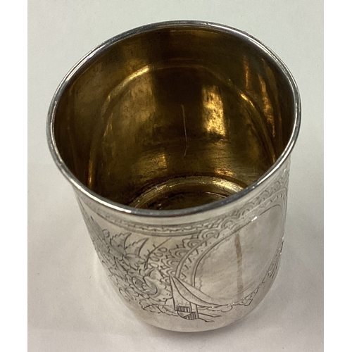 240 - A Russian silver beaker with engraved decoration. Fully marked. Dated 1893. Approx. 89 grams. Est. £... 