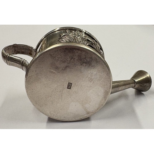 249 - A Chinese export silver model of a gardening watering can with lift-off cover. Approx. 31 grams. Est... 