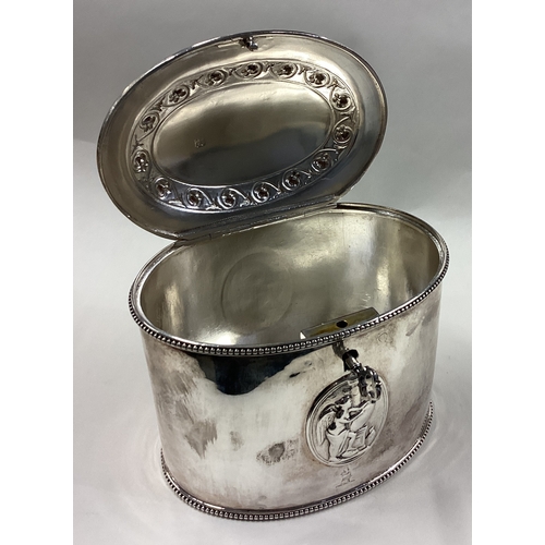 261 - An 18th Century George III silver tea caddy in the classical style with working key. By Andrew Fogel... 