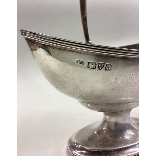 265 - CHESTER: A silver swing-handled basket in the Georgian style. 1907. Approx. 119 grams. Est. £120 - £... 