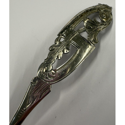 28 - A large Dutch silver spoon with pierced decoration. Approx. 18 grams. Est. £20 - £30.