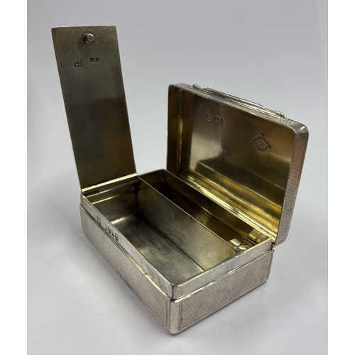 289 - An engine turned Victorian silver 'go to bed' snuff box. London 1866. By William Thomas Wright & Fre... 