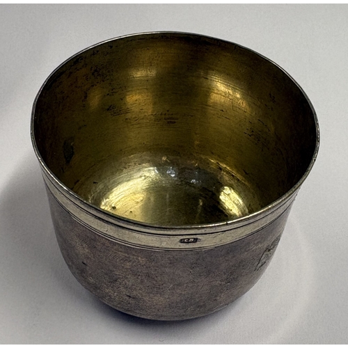 295 - An early Continental silver tumbler cup. Marked twice to base. Approx. 61 grams. Est. £300 - £400.