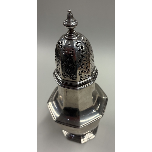 297 - A rare octagonal Victorian Britannia Standard silver sugar caster in the Queen Anne style. London 18... 