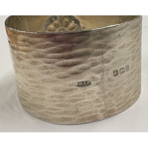 315 - A silver and enamelled napkin ring. Birmingham 1906. By William J Holmes. Approx. 36 grams. Est. £60... 