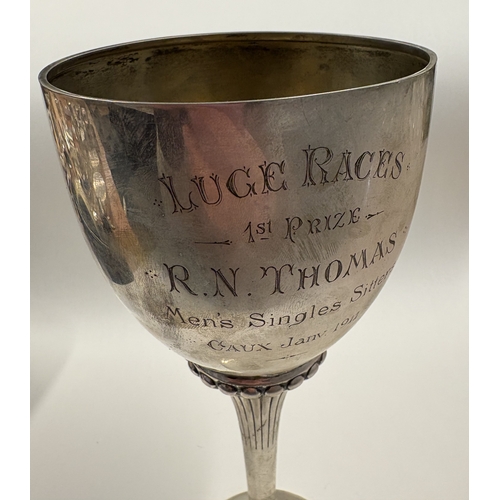 318 - A large silver trophy cup for 'Luge Races, 1st Prize, Men's Single Sitters'. Marked to foot. Approx.... 