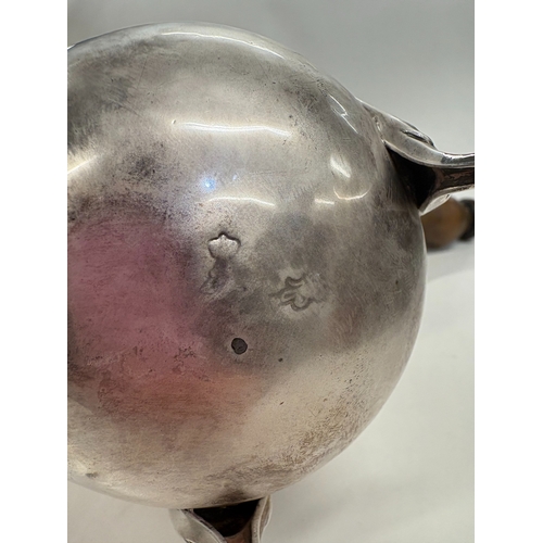 322 - An 18th Century French silver side-handled chocolate pot. Marked to base and cover. Approx. 527 gram... 