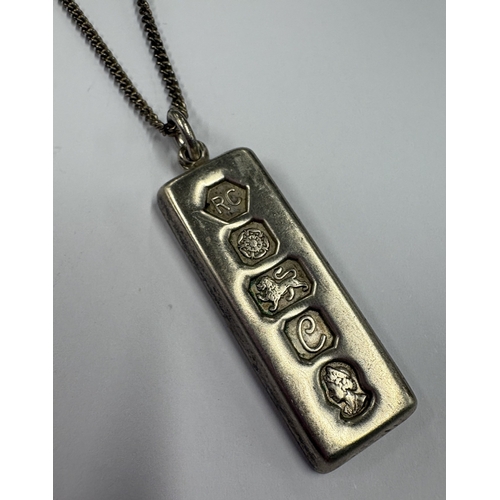 330 - A silver ingot bar on suspension chain commemorating the Jubilee. London 1977. By RC. Approx. 34 gra... 