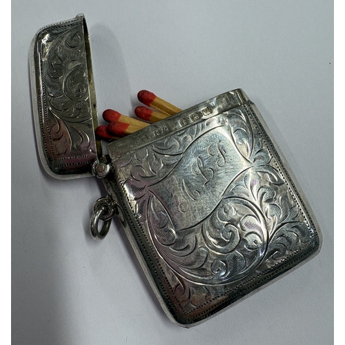 334 - An engraved silver vesta case. Birmingham 1920. Approx. 33 grams. Est. £20 - £30.