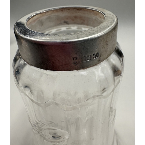 340 - An early 20th Century silver mounted glass vase with etched floral decoration. Est. £10 - £20.