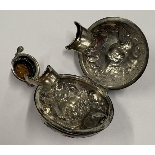 355 - A Victorian silver scent flask decorated with cherubs. London 1896. By William Comyns. Approx. 46 gr... 