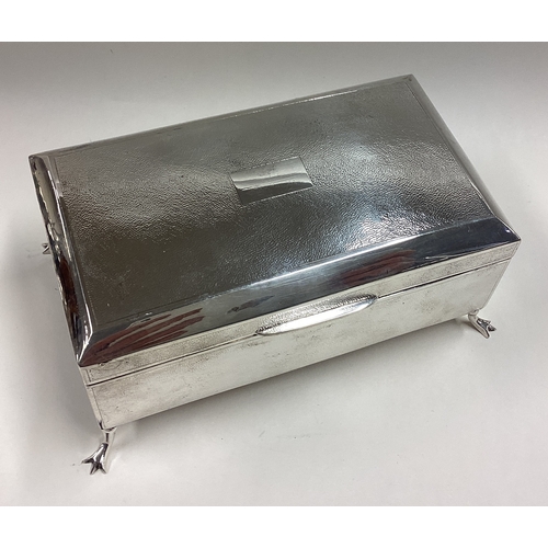 374 - A Chinese export silver cigar box on feet. Marked to base. Approx. 500 grams. Est. £400 - £600.