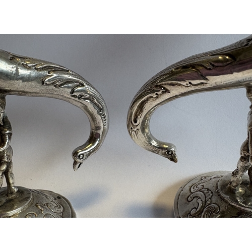 382 - An impressive pair of novelty figural Victorian silver vases bearing import marks. Marked to bodies.... 