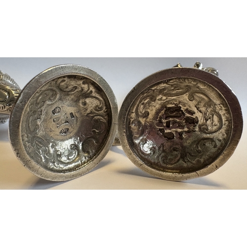 382 - An impressive pair of novelty figural Victorian silver vases bearing import marks. Marked to bodies.... 