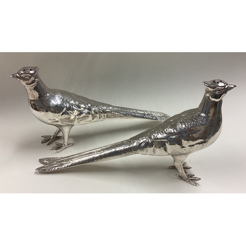 408 - A pair of Sterling silver peppers in the form of pheasants with lift-off covers. Approx. 250 grams. ... 