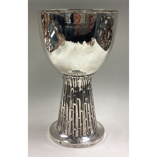 412 - A silver goblet with hammered stem. Sheffield 1977. By Brian Asquith. Approx. 514 grams. Est. £400 -... 