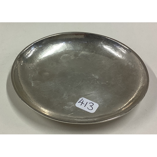 413 - A Chinese export Nanking silver counter dish. Marked to base. Approx. 45 grams. Est. £40 - £60.