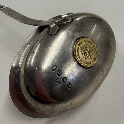 445 - A silver toddy ladle inset with gold coin. London 1803. Approx. 56 grams. Est. £200 - £300.