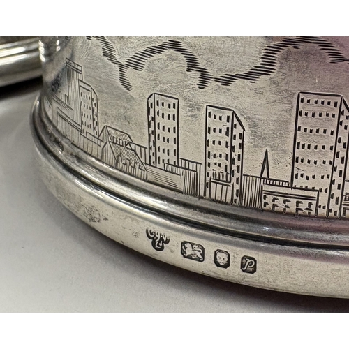 447 - A fine pair of silver coasters with engraved skyline scenes. London 1970. By CJ Vander. Approx. 430 ... 