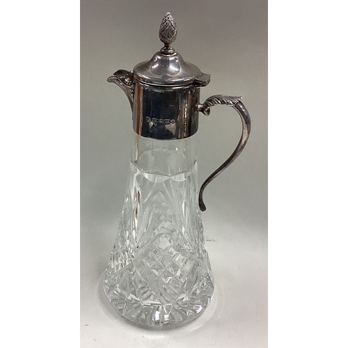 488 - A silver mounted whisky decanter / jug. Birmingham 2000. By LJM. Approx. 600 grams of gross weight. ... 