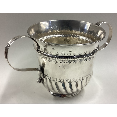 543 - A George III silver porringer of fluted design. London 1786. By Richard Palmer. Approx. 231 grams. E... 