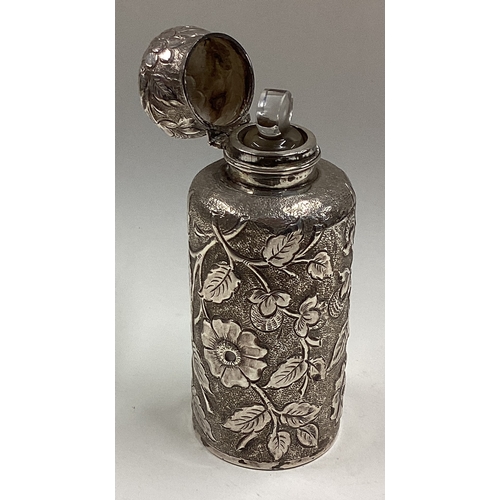 554 - A chased Victorian silver scent bottle. Birmingham. Approx. 76 grams of gross weight. Est. £100 -£15... 