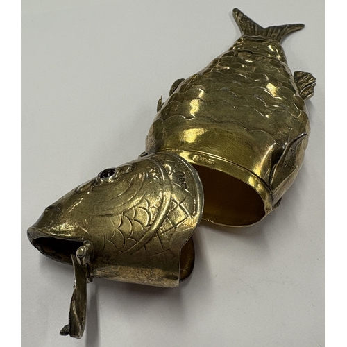 57 - A rare and fine German silver gilt articulated figure of a fish bearing English import marks. London... 