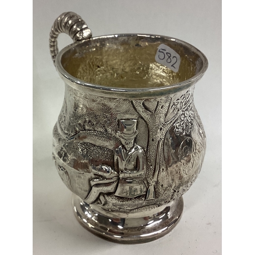 582 - A fine quality Georgian silver christening mug decorated with animals. London. By IF. Approx. 112 gr... 