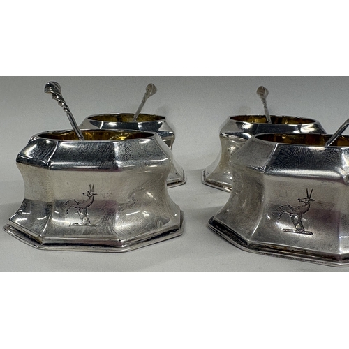 597 - A set of four octagonal Victorian silver salts in the Georgian style complete with salt spoons. Lond... 