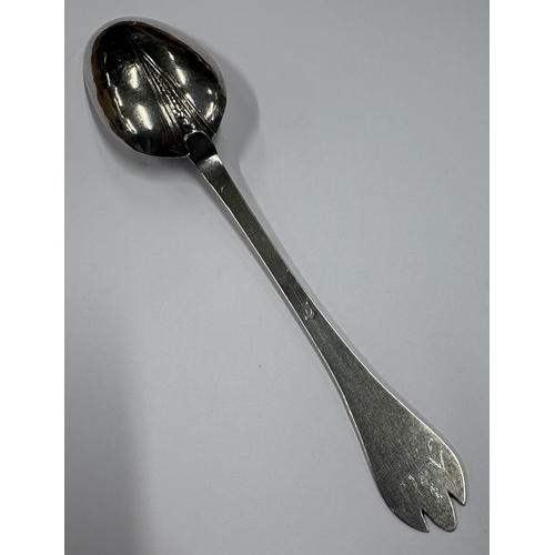 602 - A large and oversized silver trefid spoon with rat tail back and beaded decoration. Possibly Exeter?... 