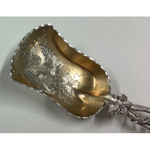 612 - A fine Victorian silver caddy scoop with vine decoration. London. By C&S. Approx. 25 grams. Est. £50... 