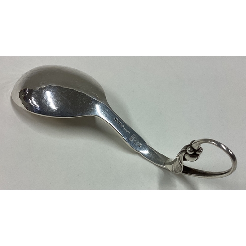 615 - GEORG JENSEN: A stylish silver caddy spoon of typical form. Numbered 21 to reverse. Approx. 38 grams... 